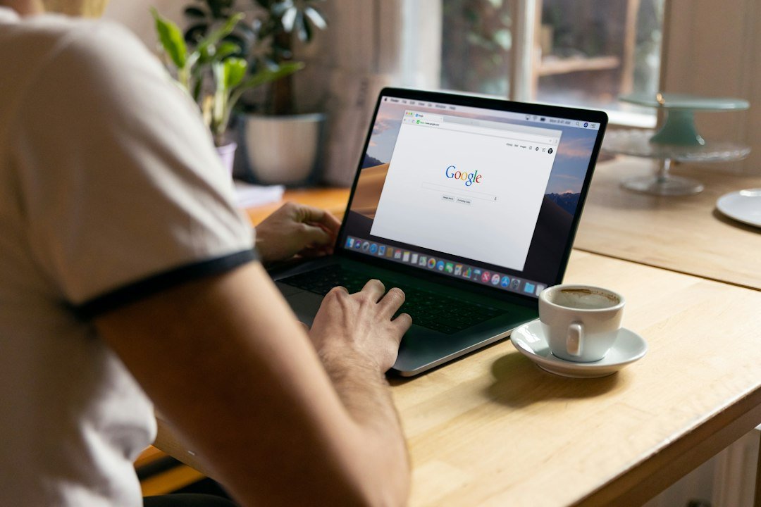 Business owner researching online visibility and search results on a laptop