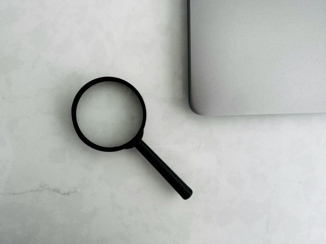 Business owner researching website visibility and search performance on a laptop