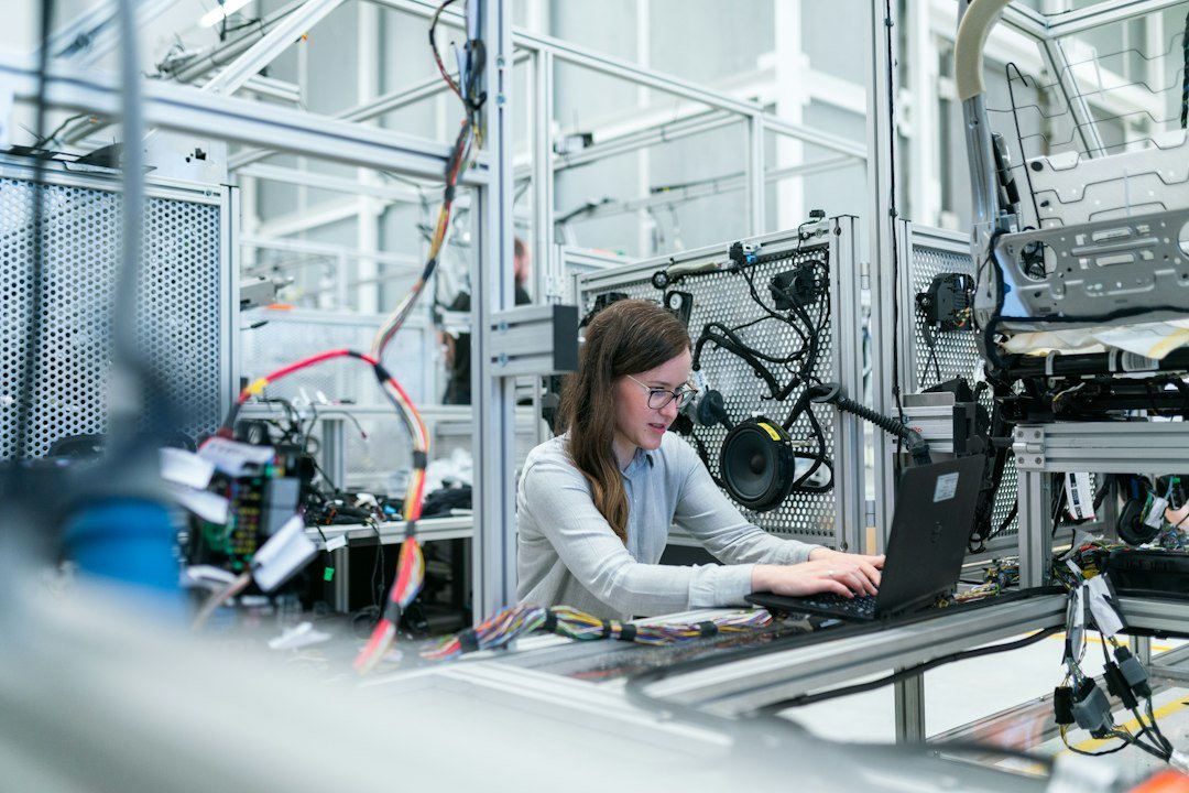 Engineer working with technology in an industrial setting